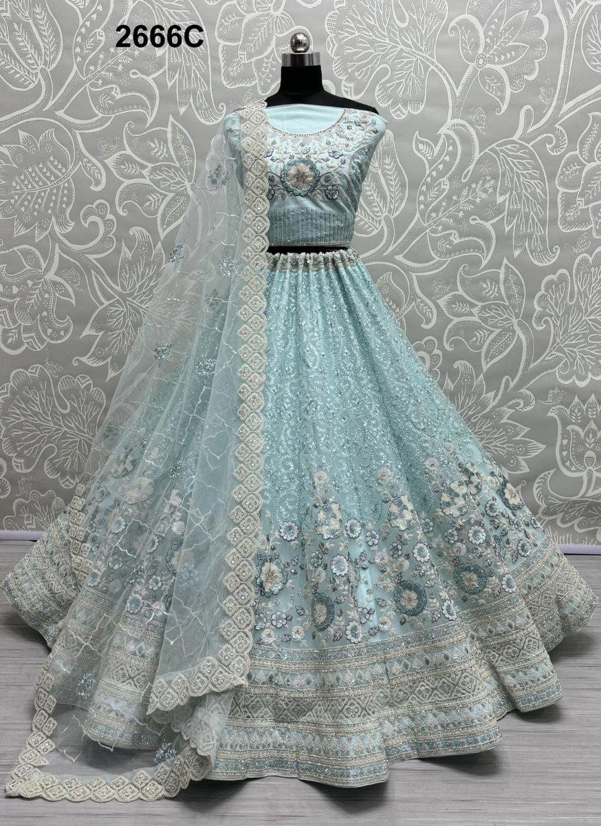 D.NO. 2666A TO 2666C BY ANJANI ART HEAVY NET LEHENGA CHOLI WHOLESALER IN INDIA 1
